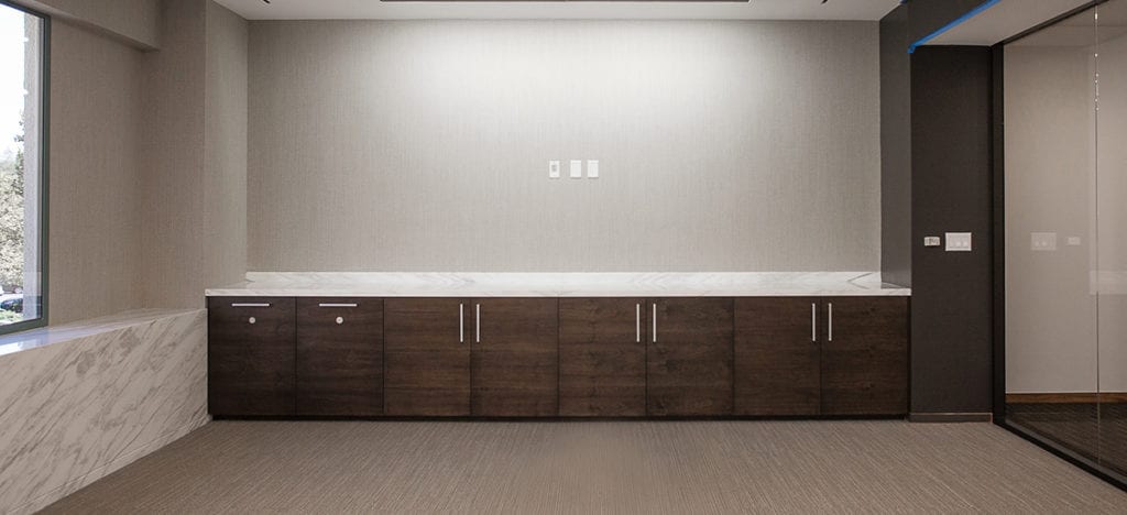 grey wall dark cabinets