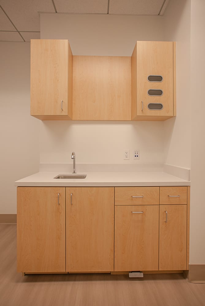white wood cabinet with sink