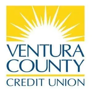 Logo of Ventura County Credit Union. Ideal for a commercial or landing page, the graphic features a yellow sunburst above the name in uppercase blue letters. Two yellow lines frame the text 